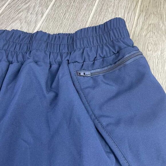 Training Sweat Wicking Fabric Shorts with Side Zipper Pocket Garterized Waistban - Picture 2 of 6